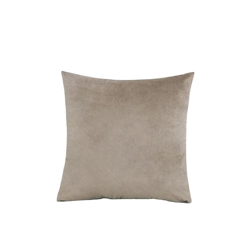 Beige pillow on a white background