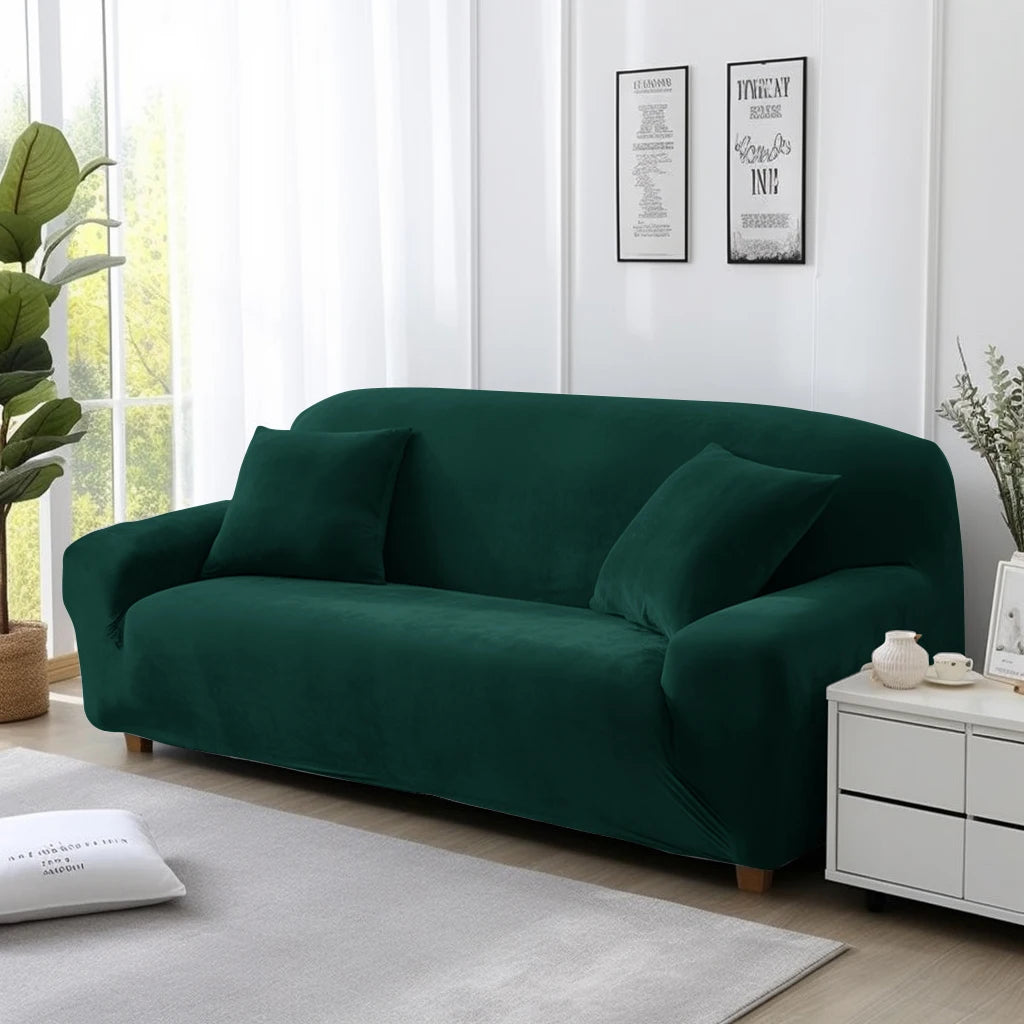 Green sofa cover on lounge in a living room with white walls and decor