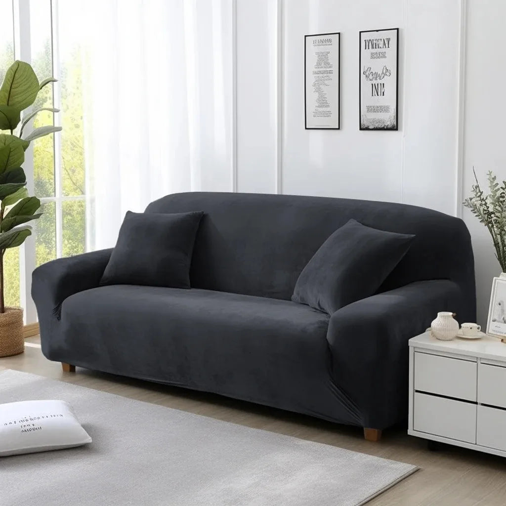 Black sofa cover on lounge in a living room with white walls and decor