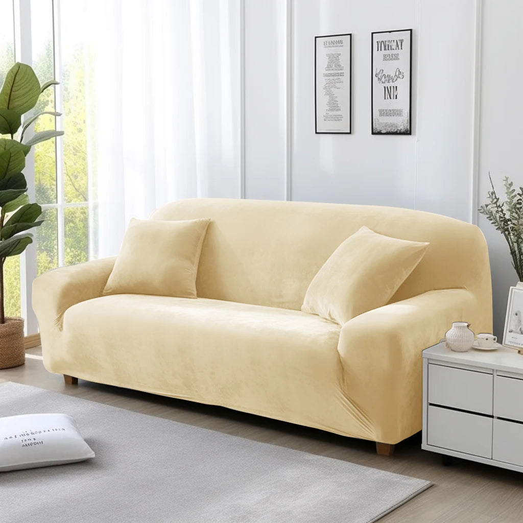 Beige sofa cover on lounge in a living room with white walls and decor