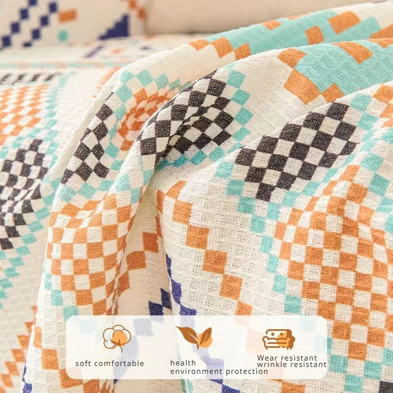Patterned fabric with geometric designs in various colors, featuring a label indicating properties of the fabric.