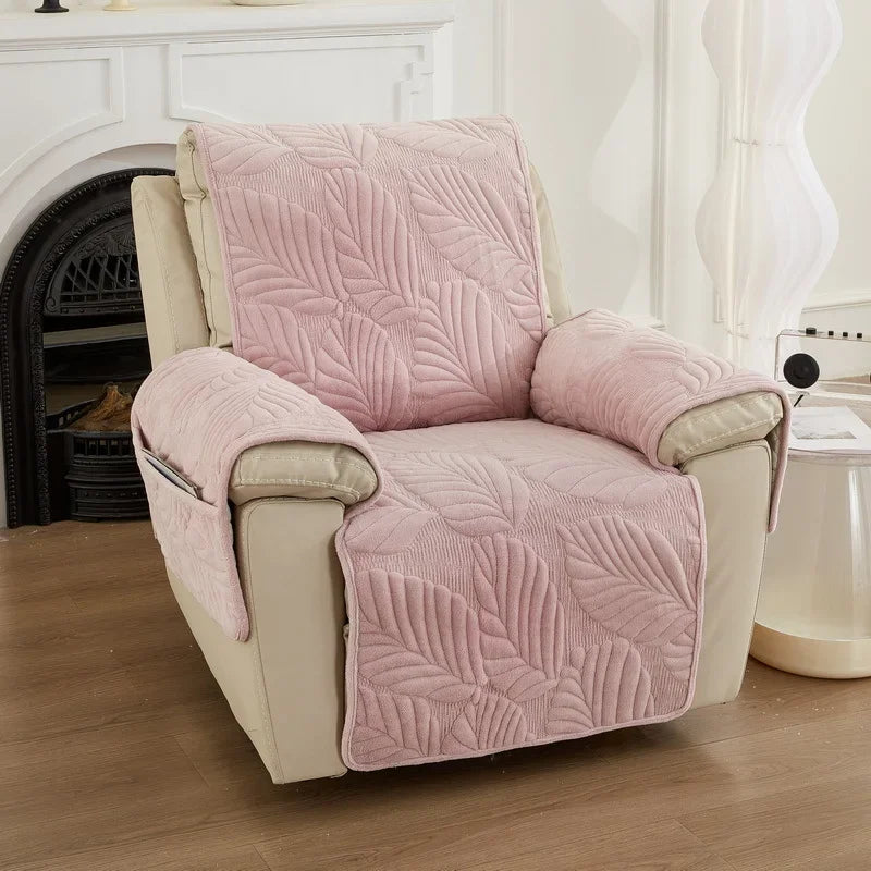 Pink textured chair cover on a beige recliner chair in a living room setting.